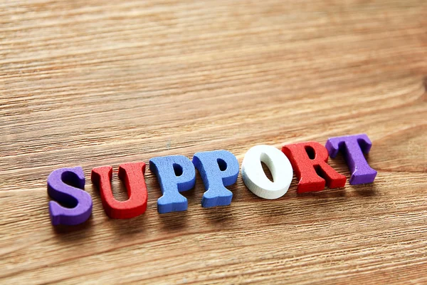 Support   letters   on   wood — Stock Photo, Image