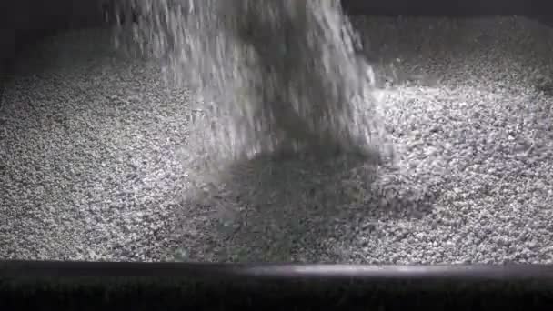 The granular cement crumb pours , slow motion — Stock Video