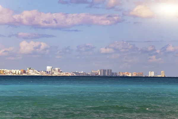 Sea and a city in the distance — Stock Photo, Image