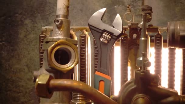 The part of gas boiler, water fittings and adjustable spanner — Stock Footage The part of gas boiler, water fittings and adjustable spanner Stock Video