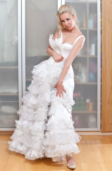 The beautiful woman with a wedding dress — Stock Photo, Image