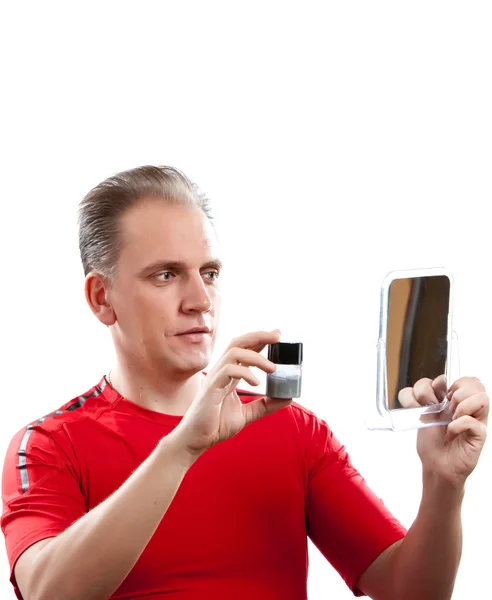 The mature man has reflected on application of a man's cream against wrinkle — Stock Photo, Image