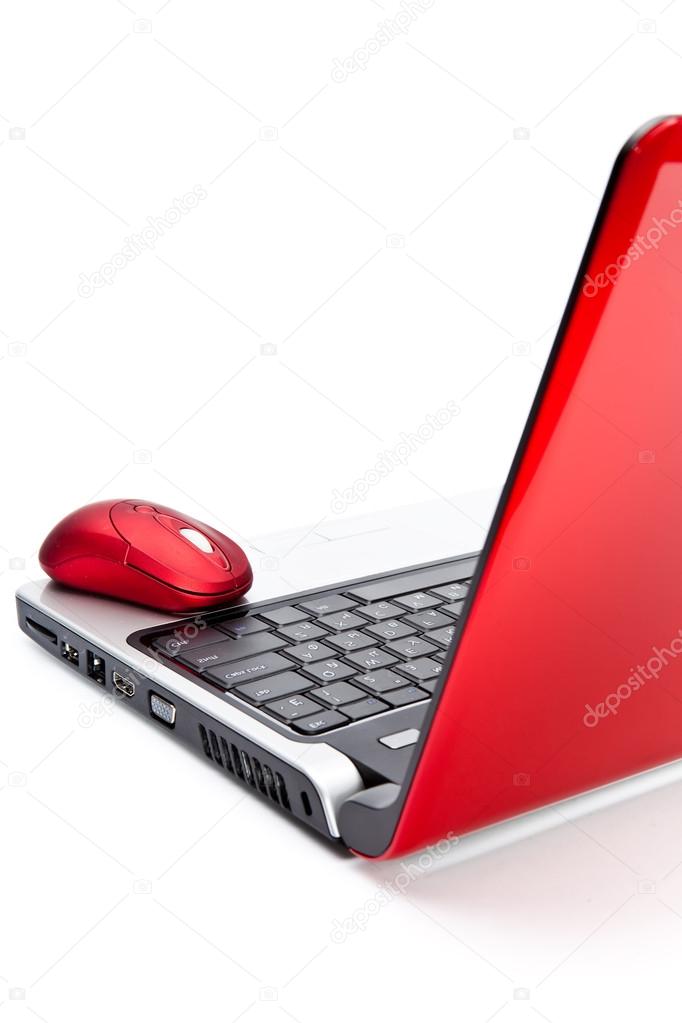 Red computer mouse and red notebook