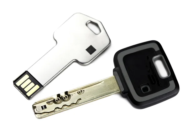 Key mechanical, crack-resistant, with high extent of protection, and a key electronic with a microchi — Stock Photo, Image