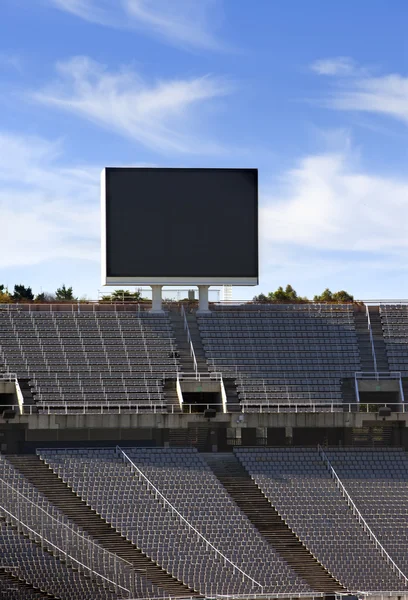 Board above empty tribunes on Barcelona Olympic Stadium  in Barcelona, Spain. — Stock Photo, Image