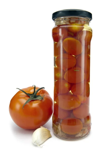 Ingeblikte tomaten in glazen potten — Stockfoto