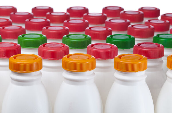 Dairy products bottles with bright covers