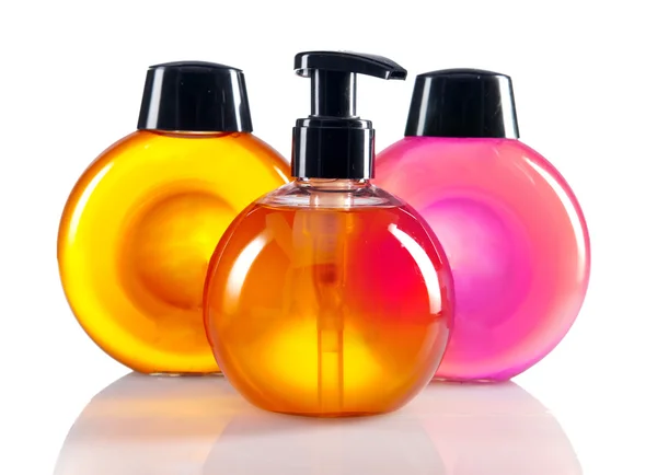 Different color cosmetic bottles — Stock Photo, Image