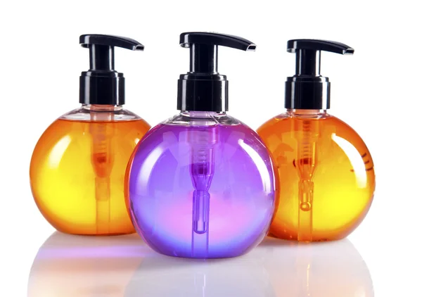 Different color cosmetic bottles — Stock Photo, Image