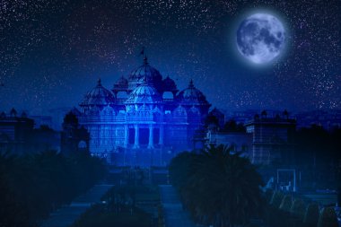 India. Delhi. The temple Akshardham by the light of the full Moon. Elements of this image furnished by NASA. clipart