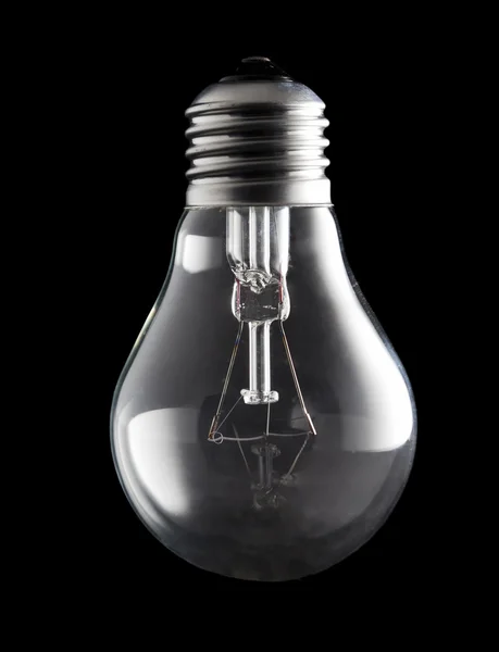 Electric light bulb on a black backgroun — Stock Photo, Image