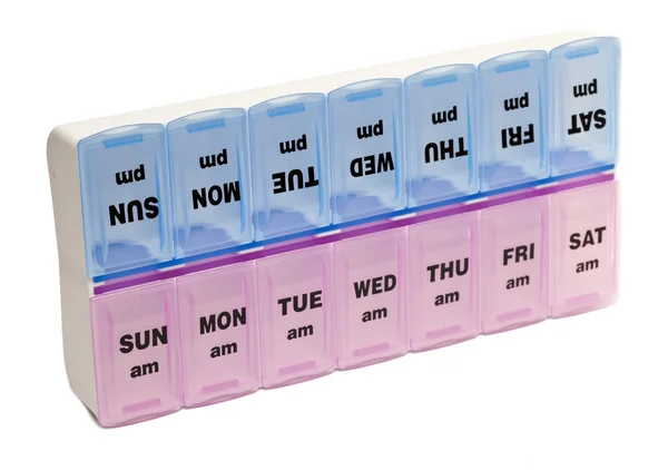 Plastikowe pudełko z małych wyciągów barwnych dla każdego dnia tygodnia (np. do leków) — Zdjęcie stockowe