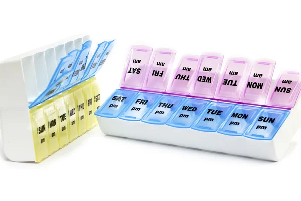 Plastikowe pudełko z małych wyciągów barwnych dla każdego dnia tygodnia (np. do leków) — Zdjęcie stockowe