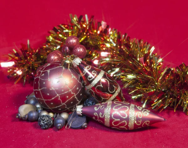 Red New Year's balls and ribbon — Stock Photo, Image