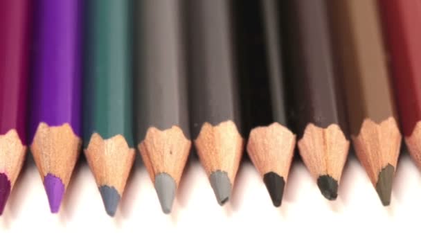 Color pencils in a row — Stock Video