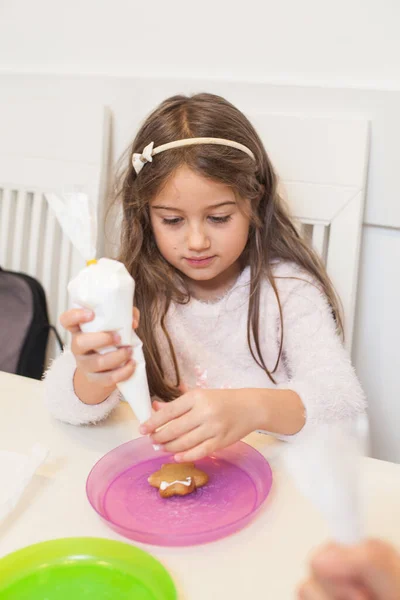 Cute Little Girl Decorating Part Christmas Gingerbread House Home Xmas — 图库照片