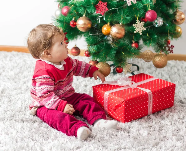 Adorable Baby With Christmas present — Stok fotoğraf