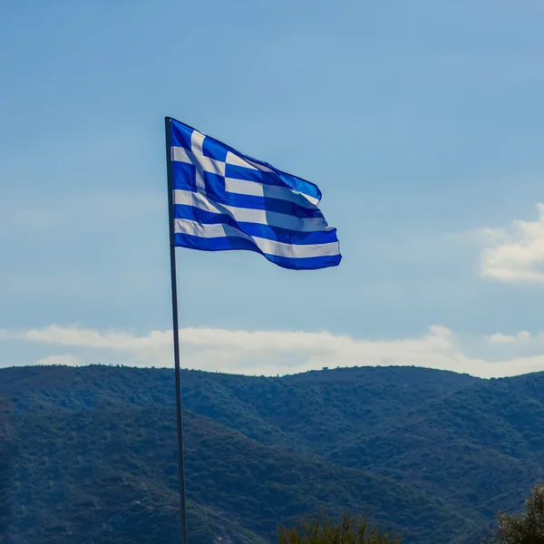 Грецький прапор махав — стокове фото