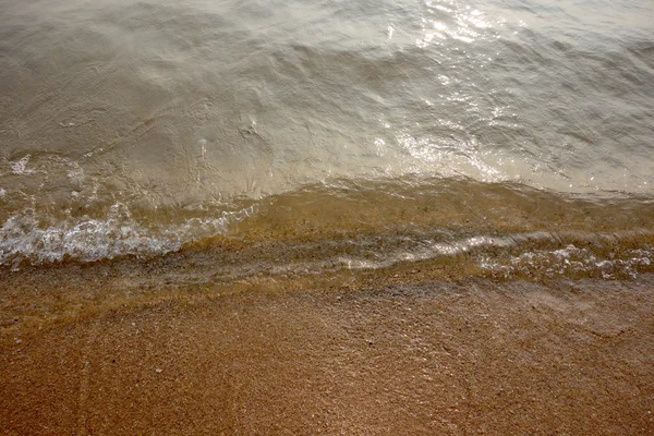 Areia e onda pequena — Fotografia de Stock