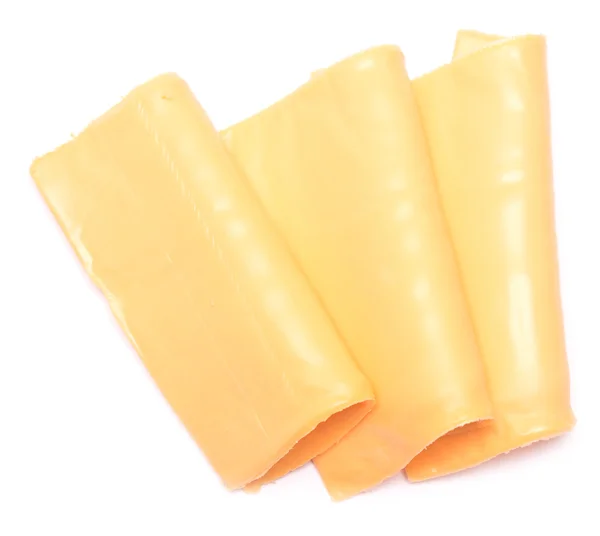 Fette di formaggio su bianco — Foto Stock