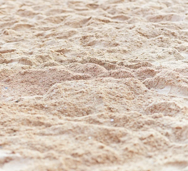 Пісок пляжу текстури — стокове фото