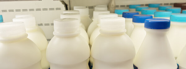 milk bottles on shelf