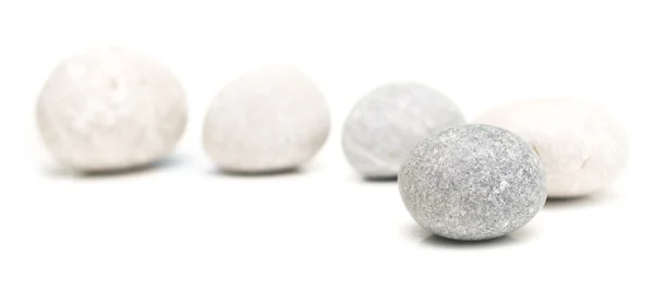 Round stones on white — Stock Photo, Image