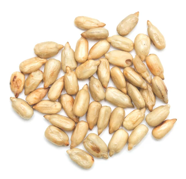 Sunflower seeds on white — Stock Photo, Image