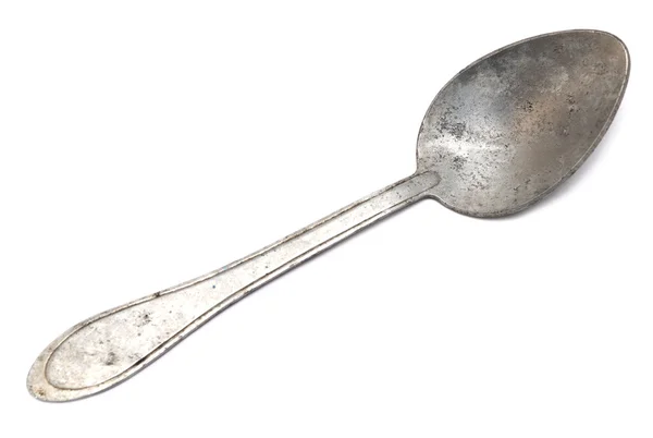 Old spoon on white — Stock Photo, Image