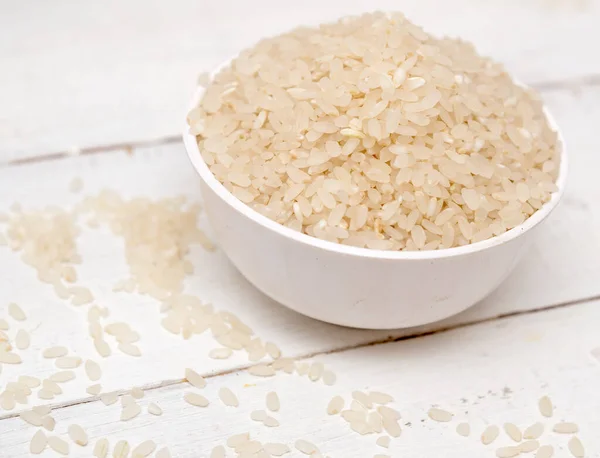 Arroz Sin Cocer Sobre Fondo Madera — Foto de Stock