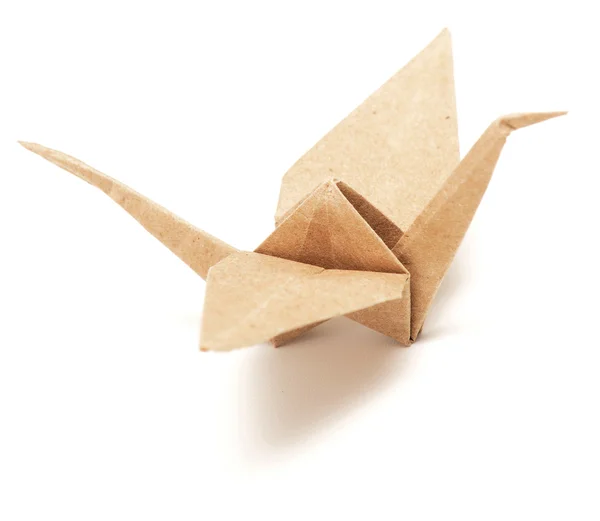 Origami jeřáb na bílém pozadí — Stock fotografie