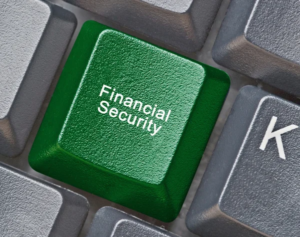 Teclado com chave para a segurança financeira — Fotografia de Stock