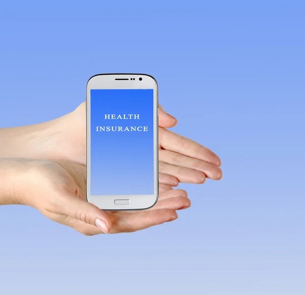 Mobile phone with "health insurance" on its screen — Stock Photo, Image