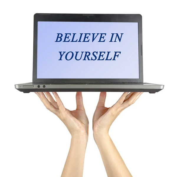 Notebook in hand with text Believe in yourself — Stock Photo, Image