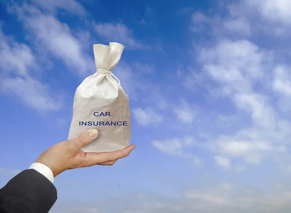 Bag with car insurance — Stock Photo, Image