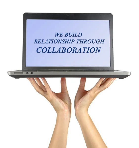 Notebook che mostra "Costruiamo il rapporto attraverso la collaborazione " — Foto Stock