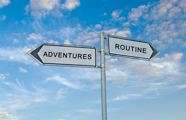 Road Signs to adventure and routine — Stock Photo, Image