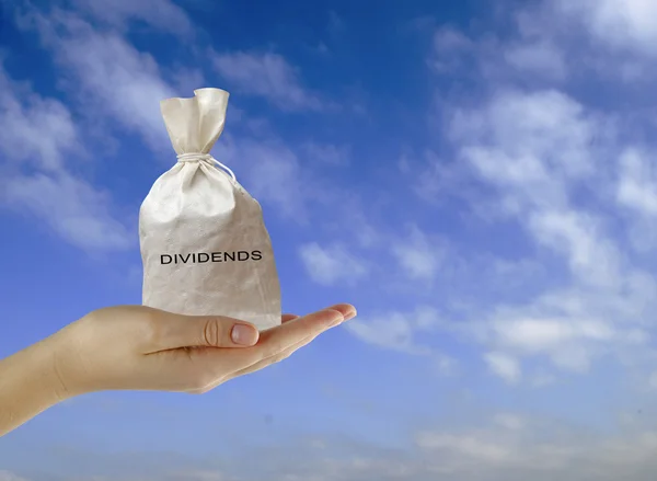 Bag with dividends — Stock Photo, Image