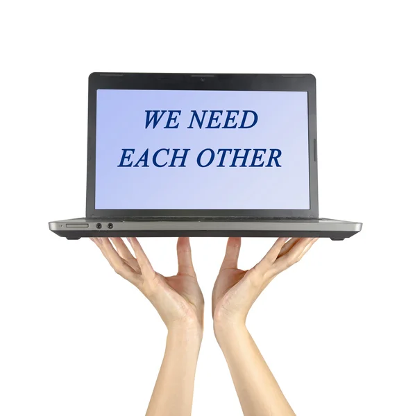 Notebook showing "we need each other" on screen — Stock Photo, Image