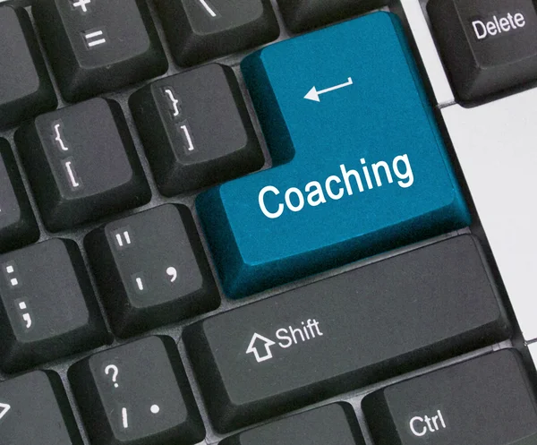 Keyboard with key for coaching — Stock Photo, Image