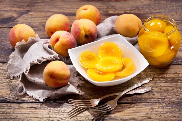 bowl of canned peaches