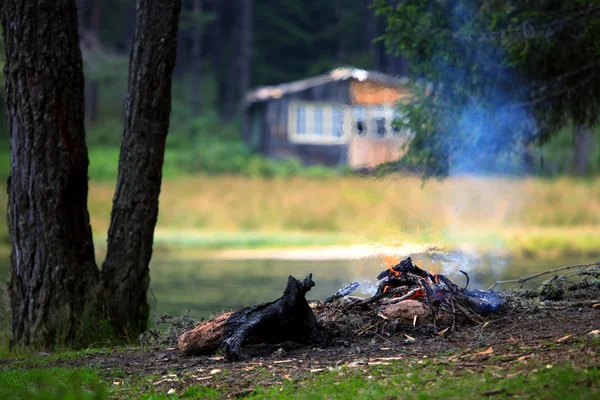 Lake and campfire — Stock Photo, Image