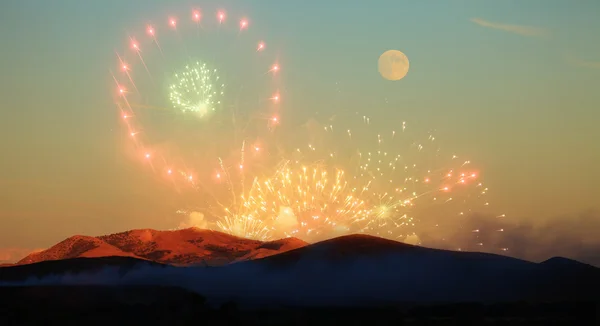 Fireworks and moon — Stock Photo, Image