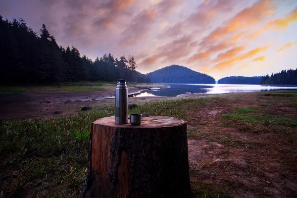 HDR sunrise lake and thermos — Stock Photo, Image