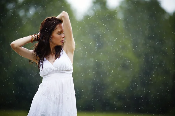 Beautiful girl under rain — Stock Photo, Image