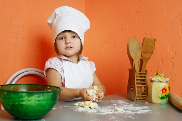 Little cute chef cooking biscuits — Stock Photo, Image