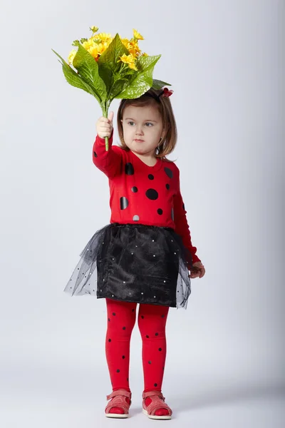 Menina engraçada em traje de joaninha — Fotografia de Stock