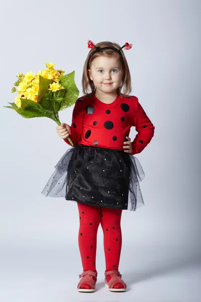 Little funny girl in ladybug costume — Stock Photo, Image