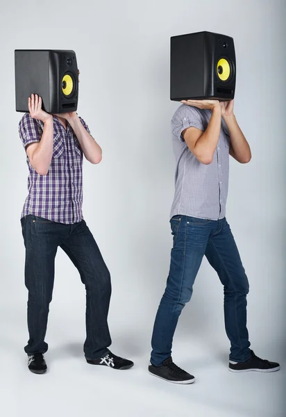 Dois meninos engraçados com alto-falantes — Fotografia de Stock