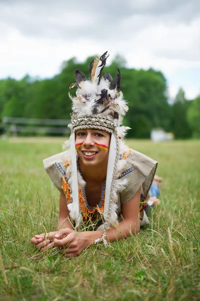 Little funny boy playing native american — Stock Photo, Image